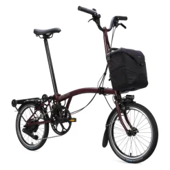 Brompton Electric C Line - 4-Speed - High Bar - Extended Seatpost - Rear Rack - 16" Elektrische Vouwfiets - 2026 - red plum