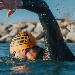 Buddyswim Siliconen Badmuts - CAUTION SWIMMER AT WORK - yellow