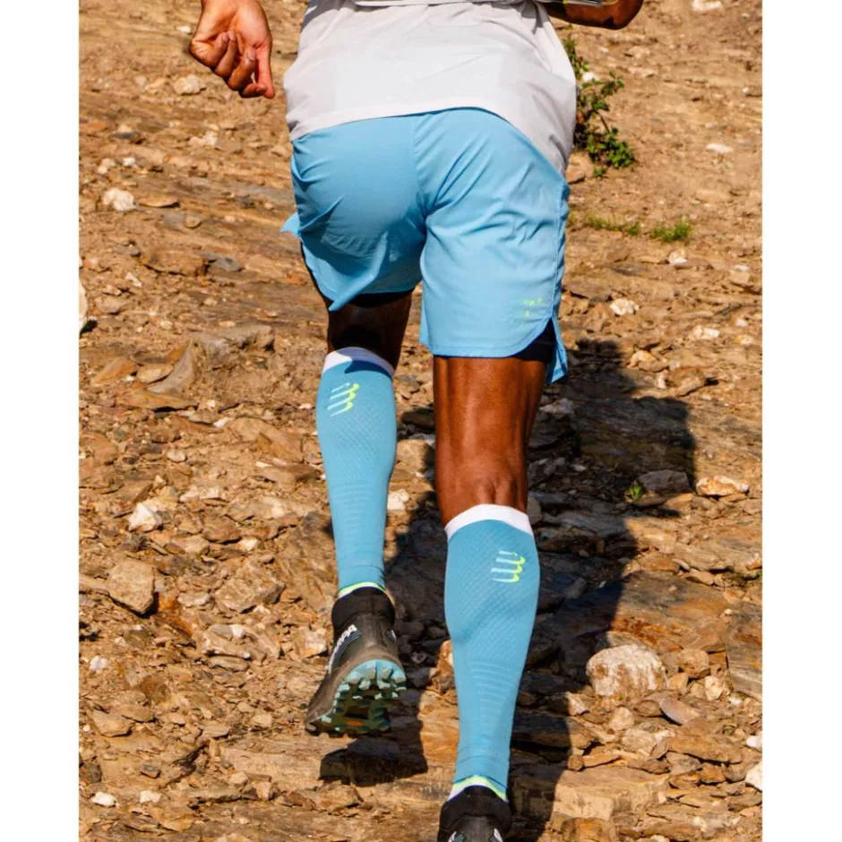 Broeken & Rokken < Compressport Trai Racing 2-in-1 hort Heren - nore bue