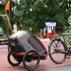 Hamax Outback One Bike Trailer for 1 Kid - Incl. Drawbar and Buggy Wheel - green / black
