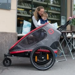 Kinderkarren < Hamax Outback One Bike Trailer for 1 Kid - Incl. Drawbar and Buggy Wheel - red / black