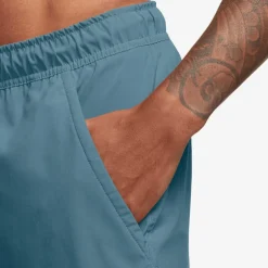 Broeken < Nike Dri-FIT Unlined Woven Korte Broek 7" Heren - mokey blue/black/mokey blue DV9340-006
