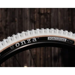 Onza Porcupine TRC MTB Folding Tire - 29x2.40 Inches - white / skinwall